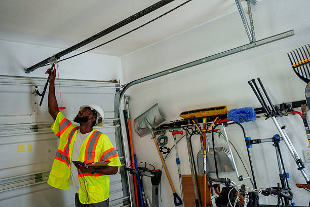 Professional Garage Door Panel Replacement technician working in Riverside, AL